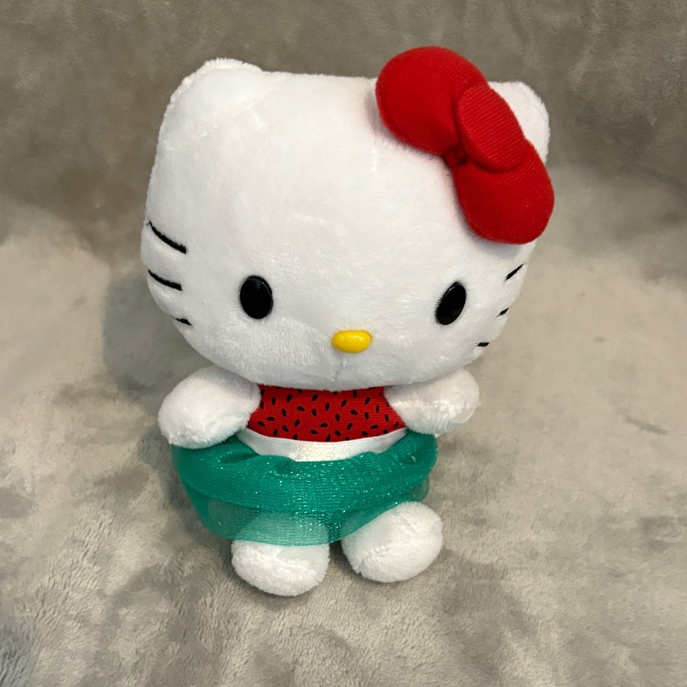 Hello Kitty Plush with Red Bow and Teal Skirt
(Watermelon)